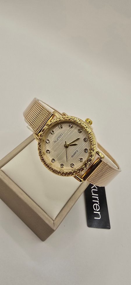 Zegarek okrągła zdobiona tarcza