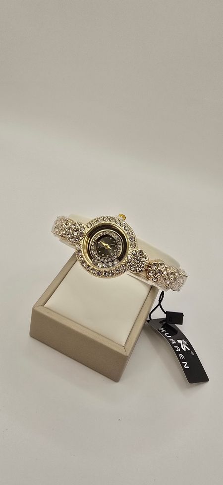 Cyrkowiowy zegarek z ciemną tarczą