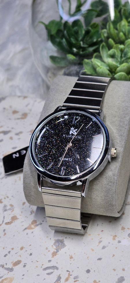 Srebrny zegarek gwieździsta tarcza